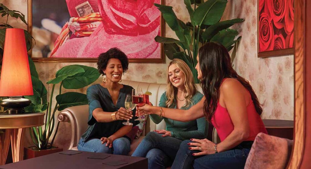 Women at Fascinators Win bar in Derby City Downtown